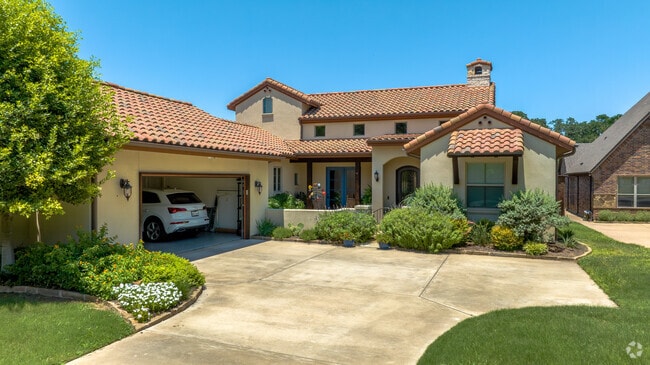 Spanish-style homes are picturesque and located near the shores of Grapevine Lake.