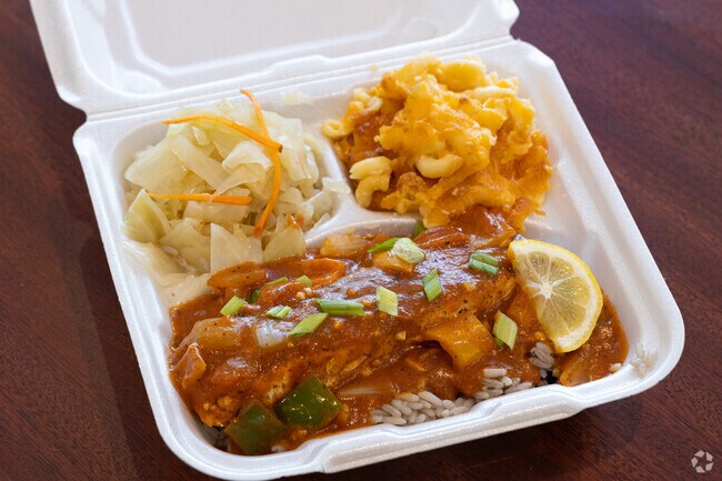 Try the Tilapia Creole dish at Kreole Kitchen located minutes from Edgemere.