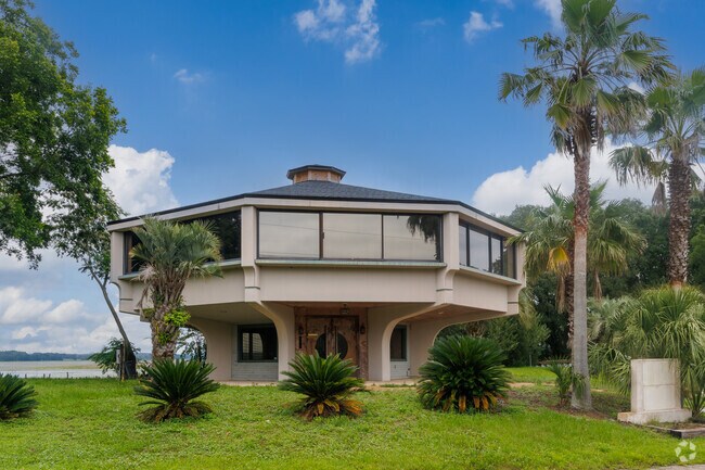 A modern house is a local landmark that sits on the bank of Lake Jackson.