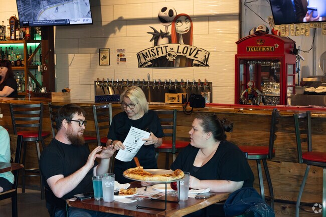 Bullwinkle's Tavern in 5 forks has delicious pizza and cold beverages.