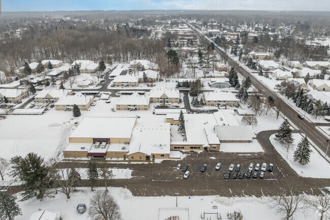 Central Lutheran High School's entrance and gymnasium.