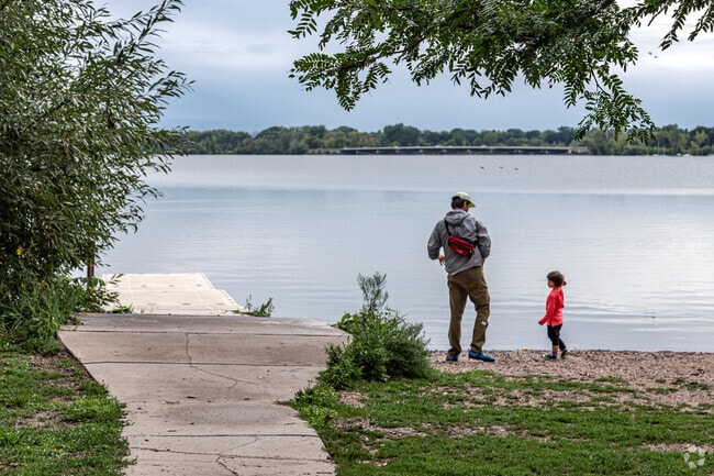 Kids of all ages enjoy frolicing along the shore of Lake Nokomis in Minneapolis.