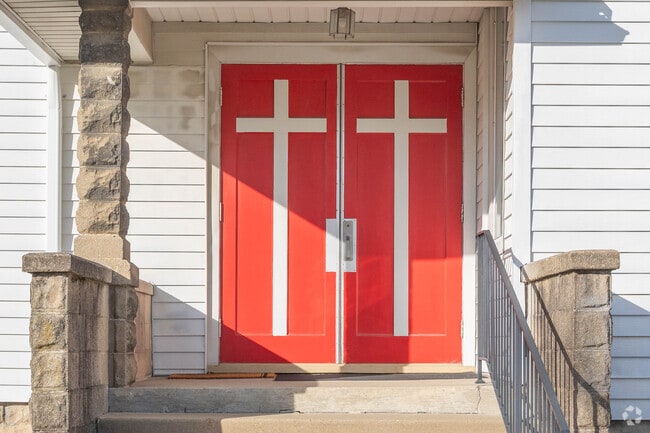 You can't help but notice the bright red doors of Hebron Christian Church.