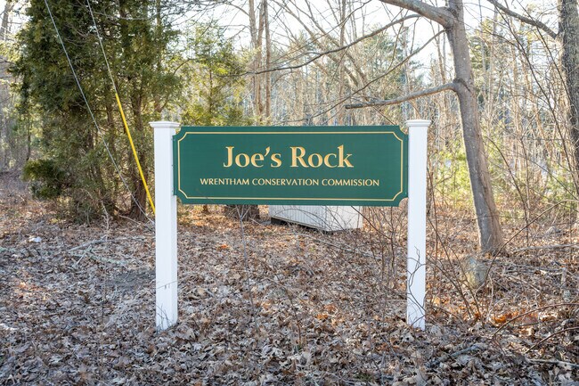 Enjoy a peaceful walk at Joe's Rock in West Wrentham, MA, with scenic trails and a beautiful pond view.