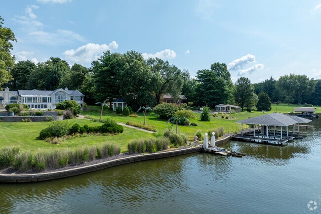 Large lawns keep neighbors at a distance on the shores of Lake Springfield.