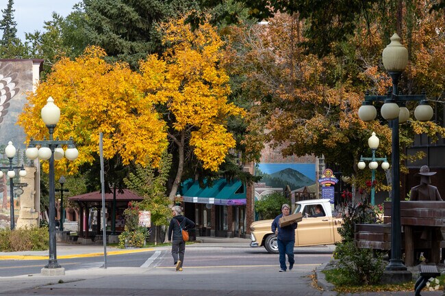 People hang out at the walking mall in Downtown Helena's Lower East Side.