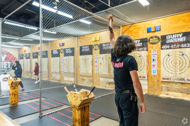 Locals of Mountaire Springs are invited to experience Bury the Hatchet, an exhilarating attraction where guests can engage in the exciting sport of axe throwing.