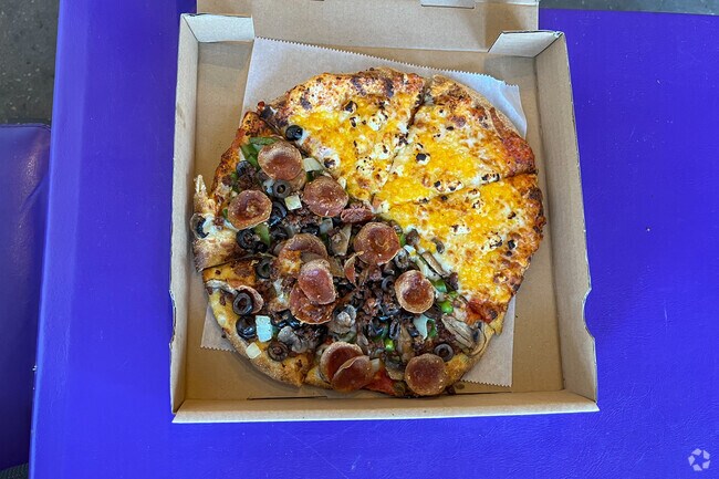 Magpies Pizza, in the Safeway plaza, offers gourmet pizza in the Houghton neighborhood.