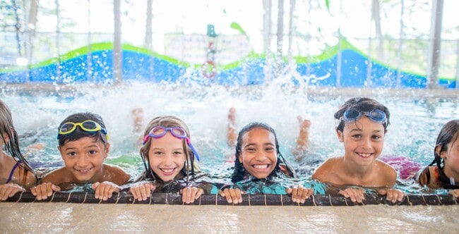 Kids kicking legs and splashing