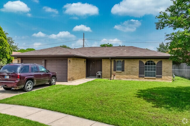 Single story homes with brick exteriors can be found in Watauga.