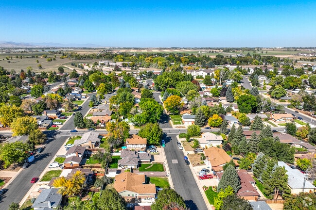 Homes in Garden Acres are lined along gridded residential streets with some alleyway access.