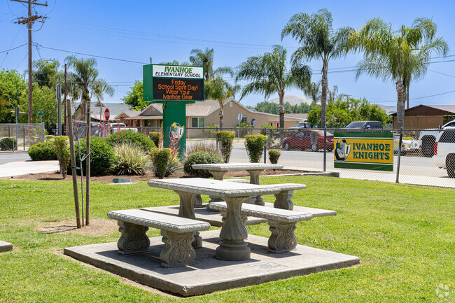 Ivanhoe Elementary School offers outside stone picnic tables for students and parents.