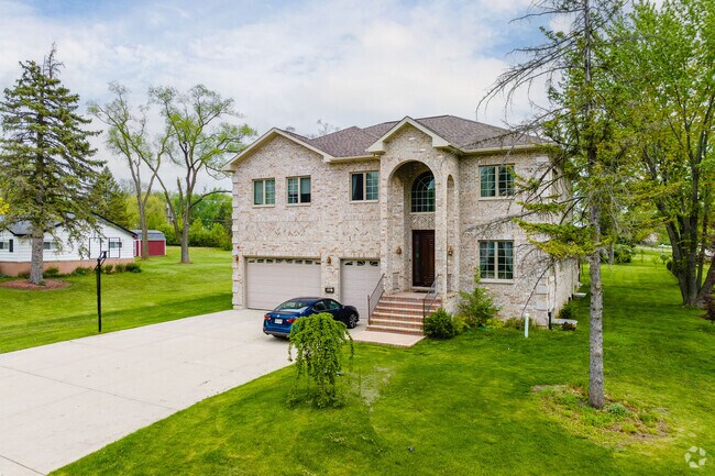 Custom built brick homes can be found throughout Woodfield.