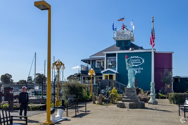 Quinn's Lighthouse is a local favorite & features patio dining, marina views and a lively bar.