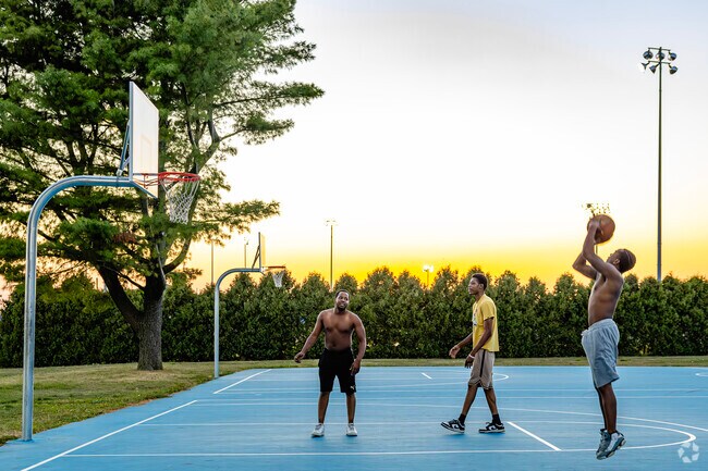 Local pickup games can get spicy at Phil St Claire Park's basketball courts near Rum Village.