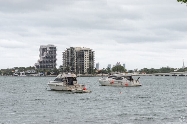 Boats will frequently park up against the Media and Entertainment District coast and relax.