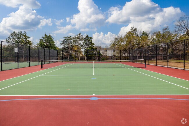 Locals practice on the tennis courts near Sunnybrook at Harrison Park.