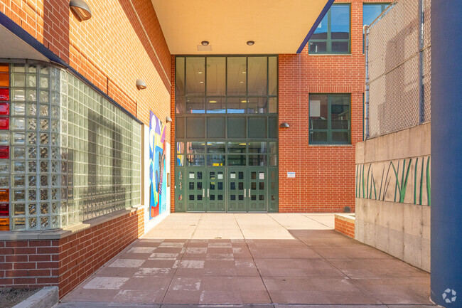 Corona Arts And Sciences Academy has a modern facade.