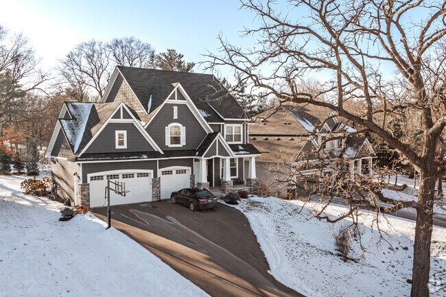 New traditional homes with three car garages are available in Midland Hills.