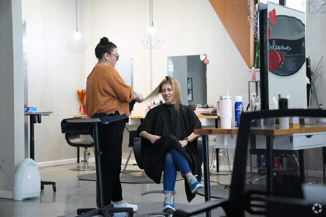 Residents get their hair styled at The Beyoutiful Salon Barber Salon.
