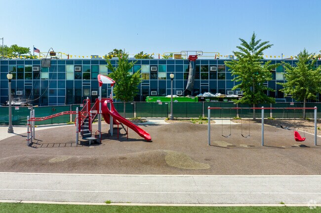 Cather Elementary School has a playground for the kids to play on.