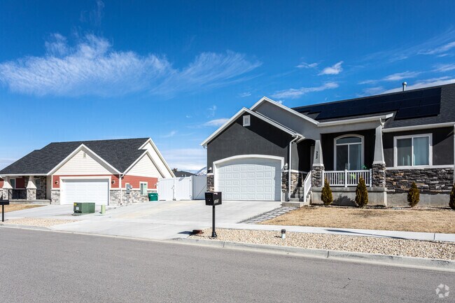 The Sharon neighborhood offers newly built ranch style homes featuring garages.
