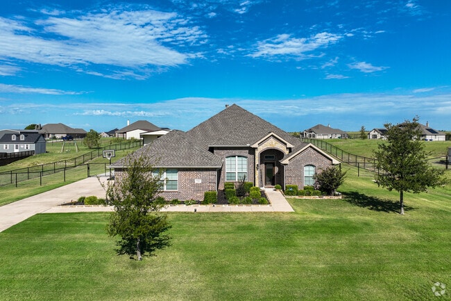Ponder features the classic Texas-style brick rambler architecture.