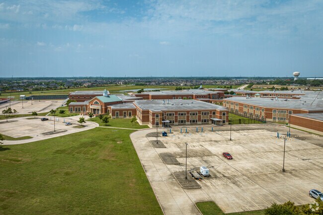 Bayside Intermediate School in League City offers ample parking and expansive green spaces.