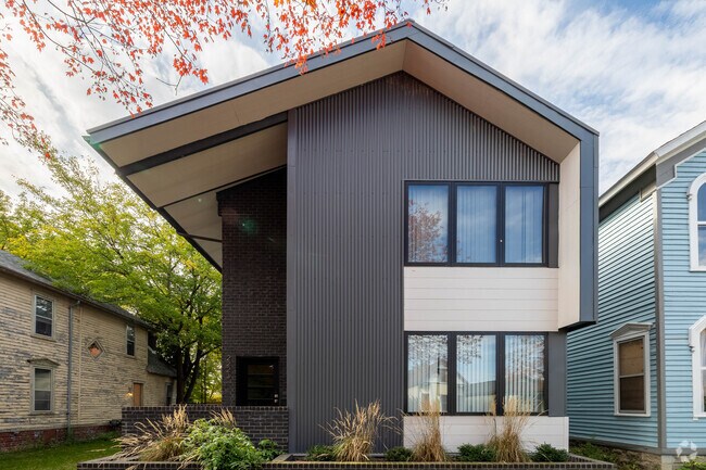 Contemporary houses sit nestled in the scenic neighborhood of Riverfront.