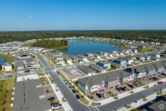 In Intercession City, a new community with a center lake offers water views.