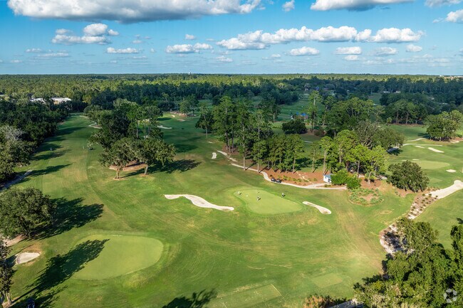 The Mark Bostick Golf Course is hidden behind vibrant murals painted along the 34th Street Wall.