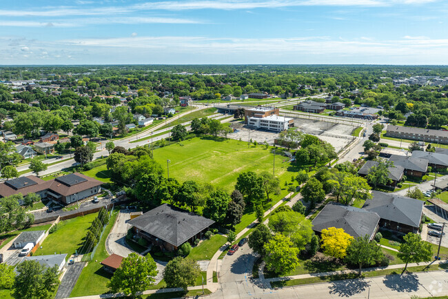 Greater Holy Temple Christian Academy in Milwaukee, WI is surrounded by small local businesses.