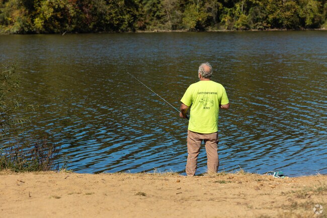 This hopeful fisherman squeezes in a moment to catch dinner at Simpson Park Lake.