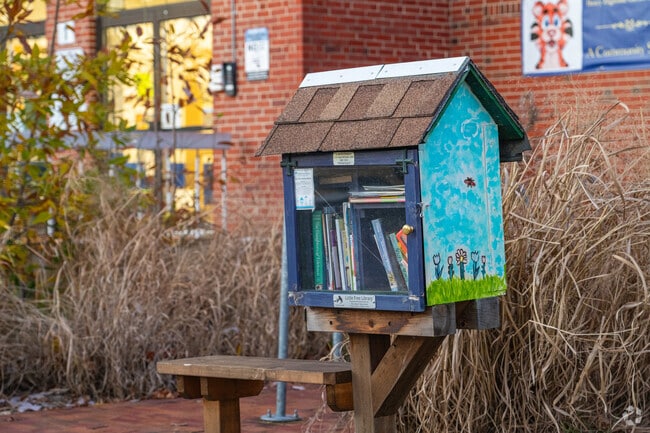 Share books at the little free library on the campus of H.H. Garnett Elementary School.