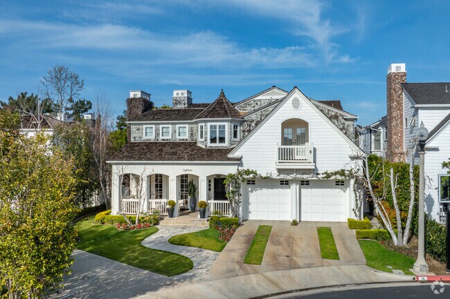 Interiors feature coffered ceilings, beadboard paneling, and rich hardwood floors, embodying the refined craftsmanship of classic Cape Cod design in Castaways.