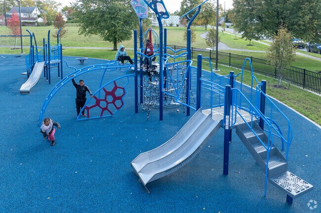 Children enjoy the new playground at Glendale Park.
