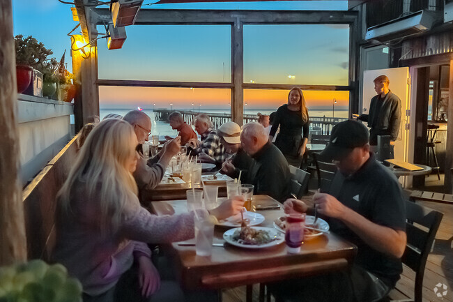 You'll adore the views at Schooners upper patio area at dusk.