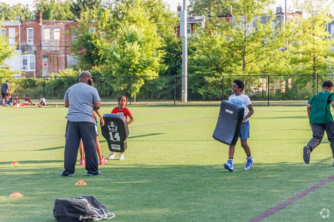 Football camps take place through the summer at the CC Jackson Rec Center in Langston Hughes.