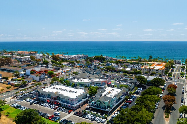 Colorful storefronts and varied architecture line the coast in Carlsbad Village.
