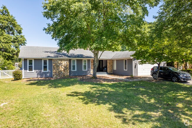 Brick ranch-style homes with garages are typical across all of Springdale.