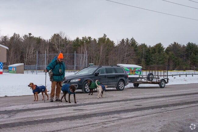 Milton residents bundle up and prepare for a fun and nature-filled walk at Bombardier Park.