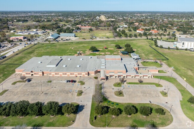 View Robison Elementary School from above, capturing its campus in full splendor.