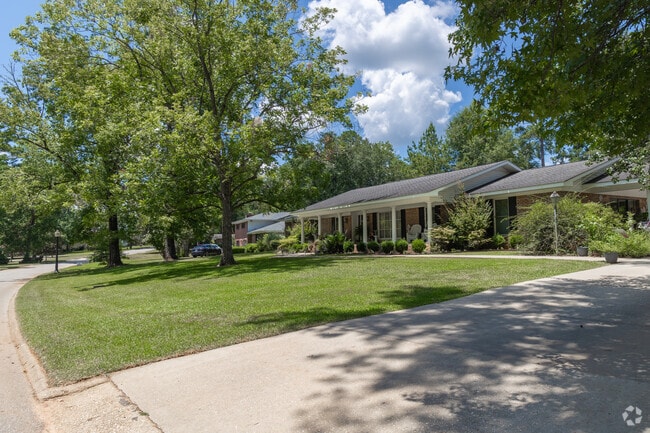 Get a nice house and some acreage in Evergreen for the same price as a tiny lot nearby.