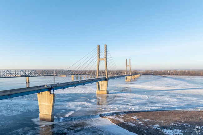 The Quincy Bayview Bridge welcomes visitors over the Mississippi River into town.