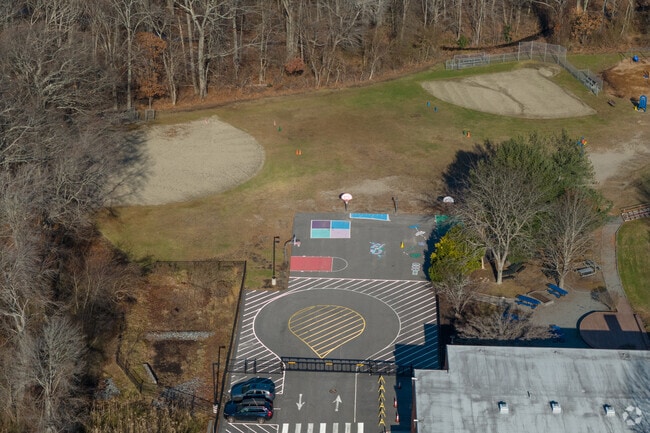 Ball fields and hardtop play spaces are part of the Nayatt School in Barrington.