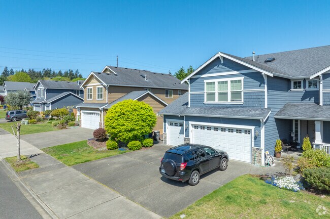 Developments of large newly constructed Craftsman homes can be found in Madrona Meadows.