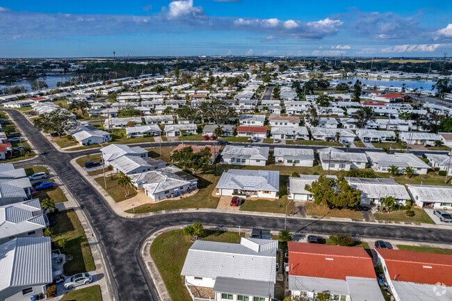 Pinellas Park has a few 55+ communities like mainland offering a golf course & pool.