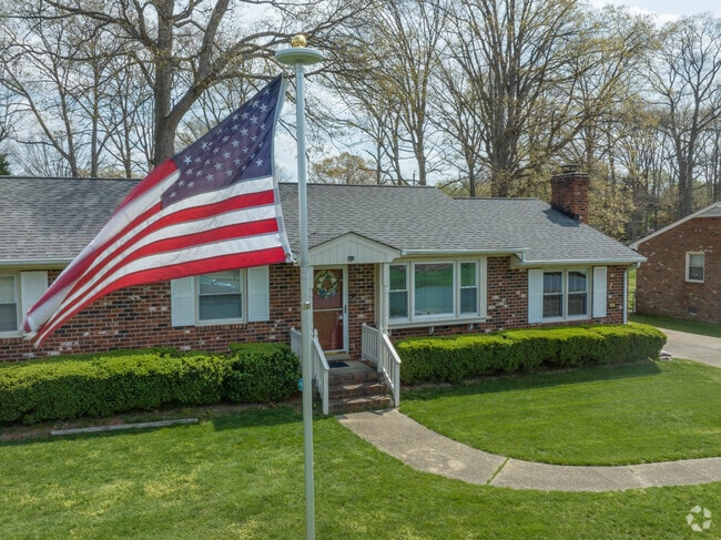 Brick ranch homes and well-manicured gardens make up much of McGuire Manor.