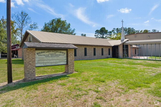 Outdoor baptisms are common at Holiday Lakes Baptist Church.