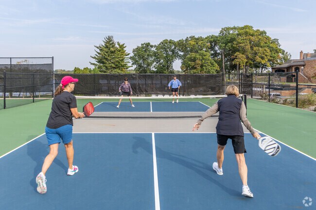 Baker Woods’ country club offers golf, pools, and athletic courts for members.